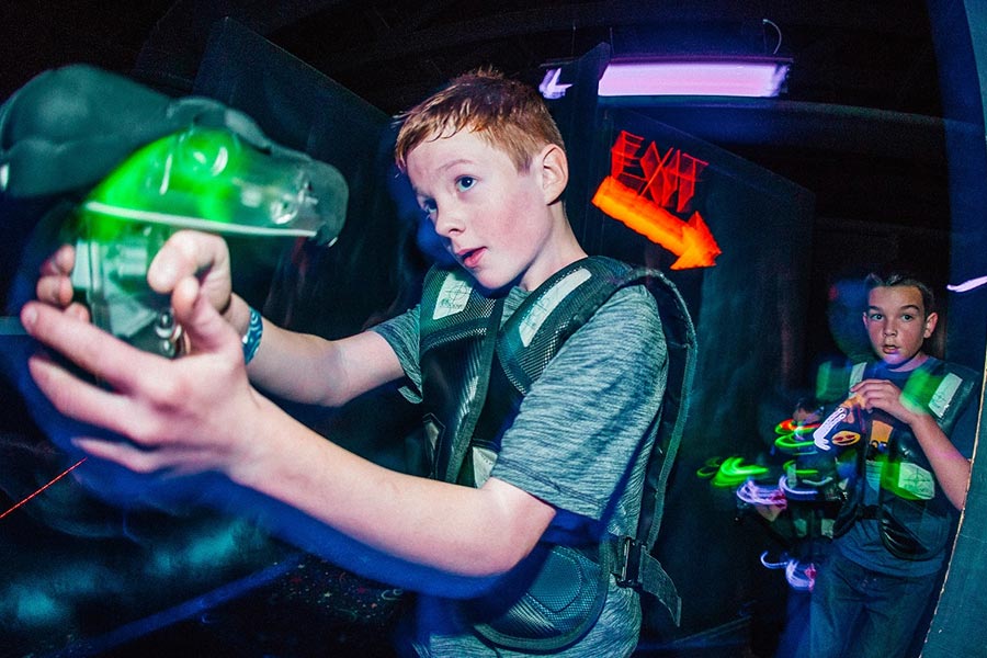 Boys Intensely Playing Lazer Tag Boys Intensely Playing Lazer Tag